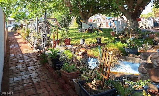 4834 E Van Buren Ave, Las Vegas, NV 89110 - view of yard featuring a vegetable garden