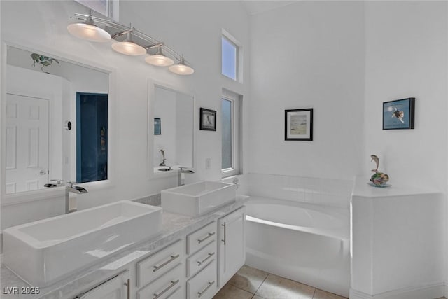 5205 Molveno Ct, Las Vegas, NV 89130 - full bathroom with double vanity, a bath, and tile patterned flooring