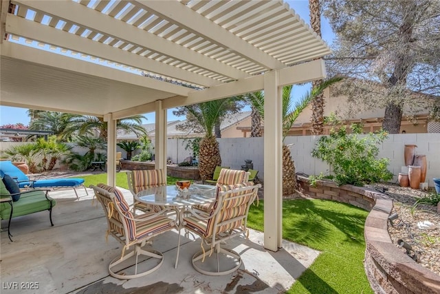 5205 Molveno Ct, Las Vegas, NV 89130 - fenced backyard with a patio, a pergola, and outdoor dining area