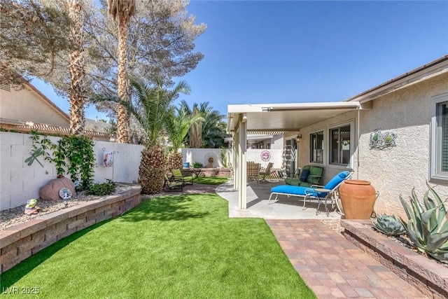5205 Molveno Ct, Las Vegas, NV 89130 - fenced backyard featuring a patio