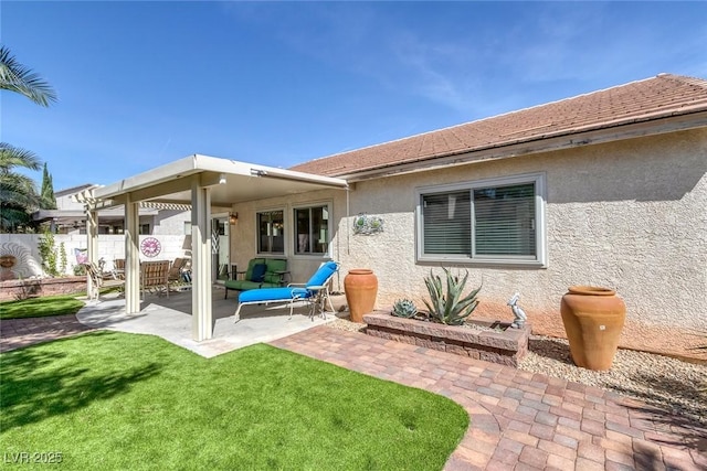 5205 Molveno Ct, Las Vegas, NV 89130 - back of property with a patio area and stucco siding