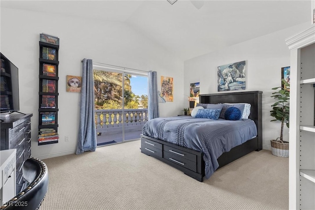 carpeted bedroom with access to outside, vaulted ceiling, and baseboards