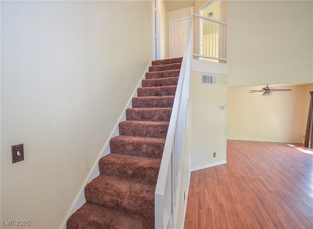 1000 Grammy Dr, Las Vegas, NV 89145 - staircase featuring wood finished floors, baseboards, and ceiling fan