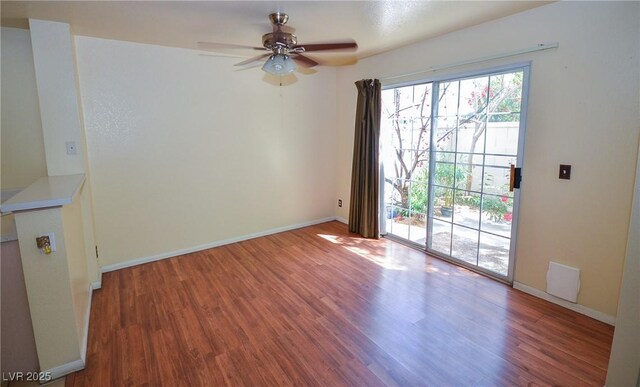 1000 Grammy Dr, Las Vegas, NV 89145 - unfurnished dining area with wood finished floors, a ceiling fan, and baseboards