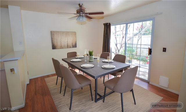 1000 Grammy Dr, Las Vegas, NV 89145 - dining area featuring wood finished floors, ceiling fan, and baseboards