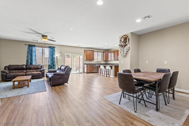 8140 Redbud Vine St, North Las Vegas, NV 89085 - dining room featuring recessed lighting, ceiling fan, light wood finished floors, baseboards, and visible vents