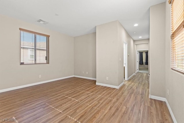 8140 Redbud Vine St, North Las Vegas, NV 89085 - spare room with baseboards, visible vents, light wood finished floors, and recessed lighting