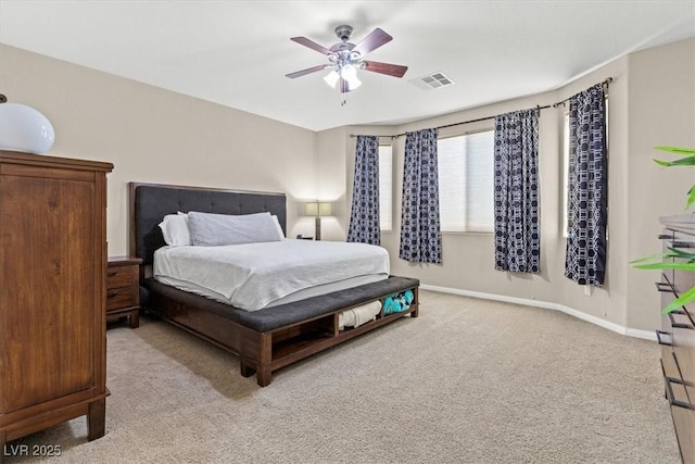 8140 Redbud Vine St, North Las Vegas, NV 89085 - bedroom with baseboards, visible vents, a ceiling fan, and light colored carpet