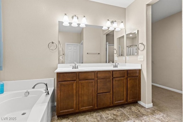 8140 Redbud Vine St, North Las Vegas, NV 89085 - full bath featuring a garden tub, double vanity, a sink, and baseboards