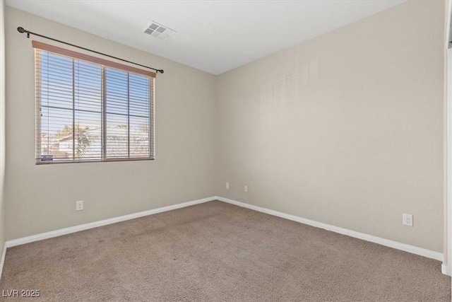 8140 Redbud Vine St, North Las Vegas, NV 89085 - empty room with visible vents, baseboards, and carpet floors