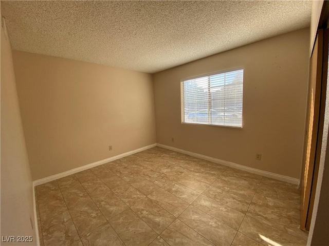 2685 Bryandouglas Dr, Las Vegas, NV 89121 - spare room with a textured ceiling