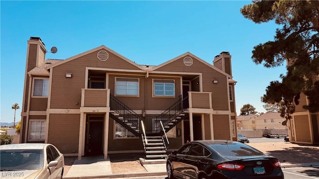 2685 Bryandouglas Dr, Las Vegas, NV 89121 - view of front of property with a chimney and stairs