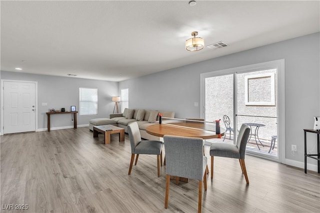 dining space featuring baseboards, recessed lighting, light wood-style flooring, and visible vents
