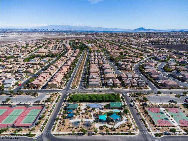 birds eye view of property featuring a mountain view and a residential view