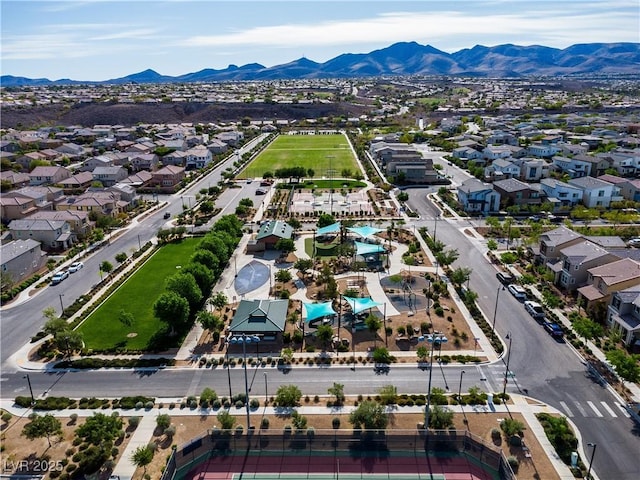 birds eye view of property with a residential view and a mountain view