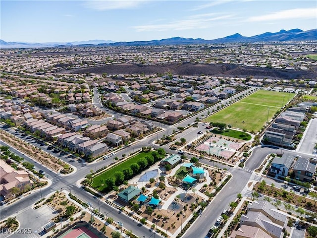 drone / aerial view with a mountain view and a residential view