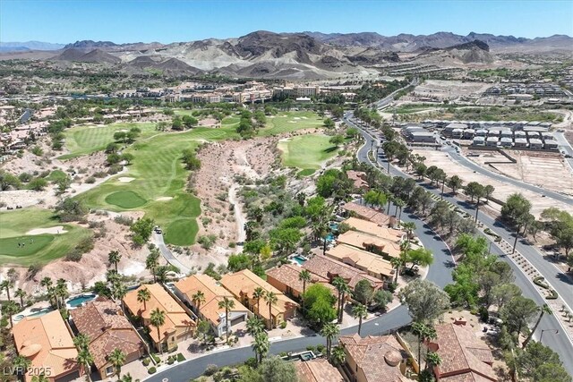 birds eye view of property with a mountain view, golf course view, and a residential view