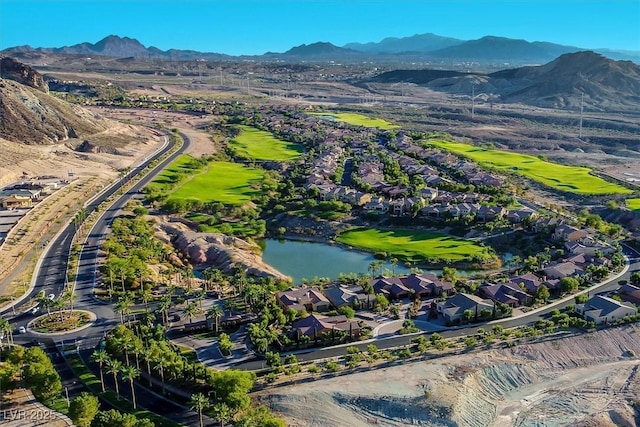 birds eye view of property with a mountain view, golf course view, and a residential view