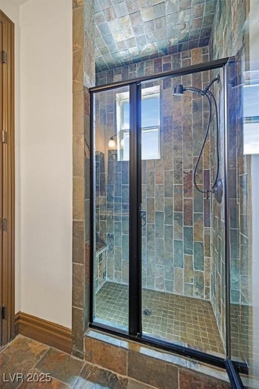 bathroom featuring a stall shower