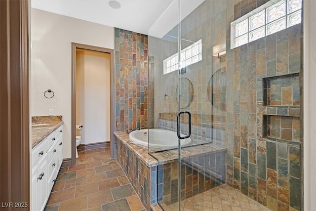 bathroom featuring a shower stall, stone tile flooring, toilet, a bath, and vanity