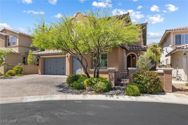 12254 Cape Cortez Ct, Las Vegas, NV 89138 - view of front of house featuring a tile roof, driveway, fence private yard, and stucco siding