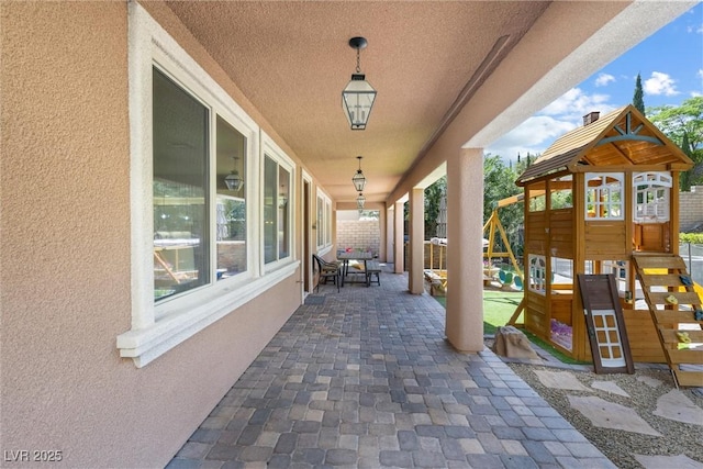 12254 Cape Cortez Ct, Las Vegas, NV 89138 - view of patio / terrace with a playground