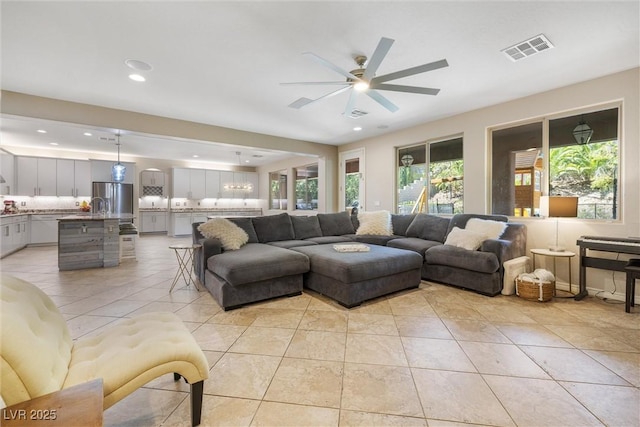12254 Cape Cortez Ct, Las Vegas, NV 89138 - living area with light tile patterned floors, recessed lighting, visible vents, and ceiling fan