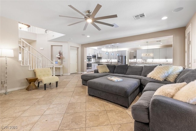 12254 Cape Cortez Ct, Las Vegas, NV 89138 - living room with recessed lighting, a ceiling fan, visible vents, and stairway