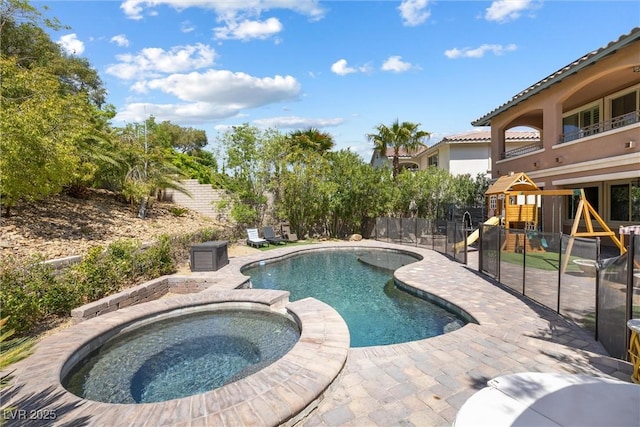 12254 Cape Cortez Ct, Las Vegas, NV 89138 - view of pool with a patio, fence, a pool with connected hot tub, and a playground