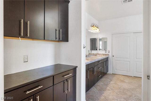 12254 Cape Cortez Ct, Las Vegas, NV 89138 - bathroom with visible vents and vanity
