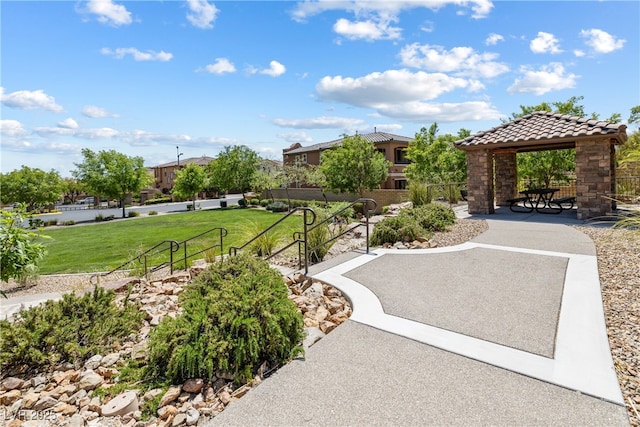 12254 Cape Cortez Ct, Las Vegas, NV 89138 - view of community featuring fence, a gazebo, and a lawn