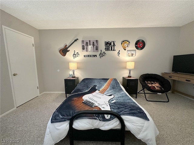 bedroom featuring a textured ceiling, carpet, and baseboards