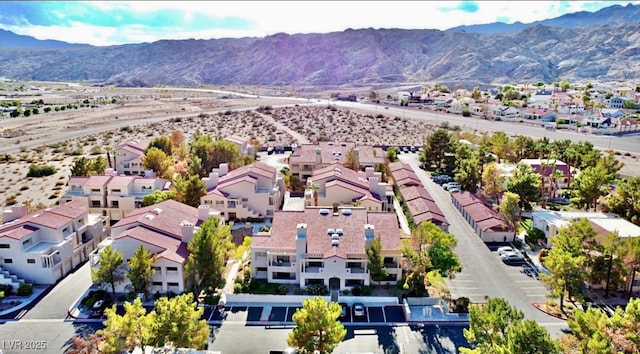 drone / aerial view featuring a mountain view and a residential view