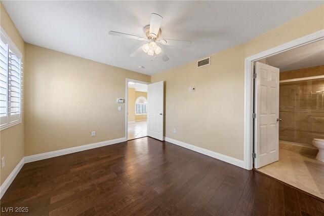 7950 W Flamingo Rd Unit 2066, Las Vegas, NV 89147 - unfurnished bedroom featuring wood finished floors, baseboards, and ensuite bathroom
