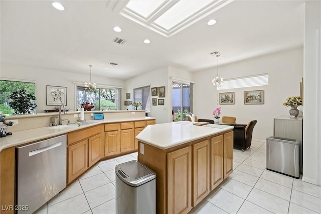 kitchen featuring light tile patterned floors, a sink, visible vents, an inviting chandelier, and dishwasher