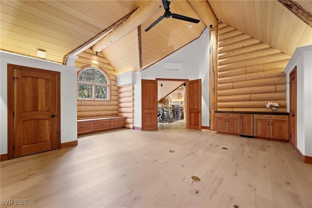 unfurnished living room with log walls, ceiling fan, wooden ceiling, beam ceiling, and light wood-style floors