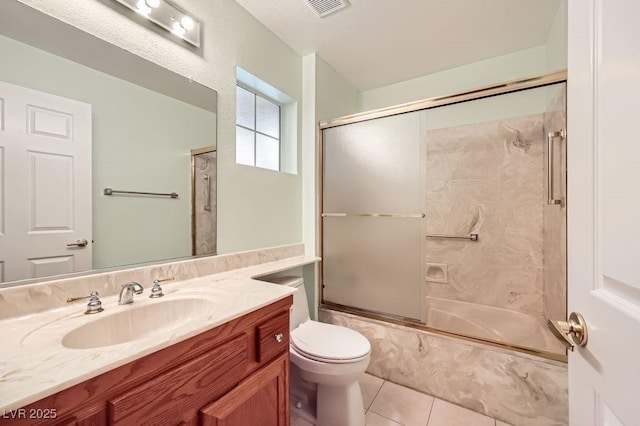 full bath featuring enclosed tub / shower combo, toilet, visible vents, tile patterned flooring, and vanity