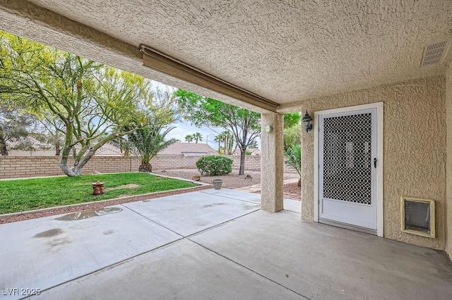 view of patio with visible vents and a fenced backyard