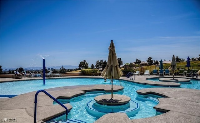 3104 Archwood Way, Las Vegas, NV 89134 - community pool featuring a hot tub and a patio area