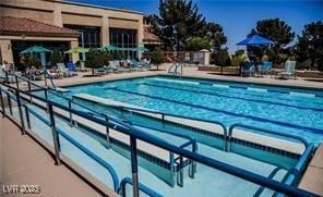 3104 Archwood Way, Las Vegas, NV 89134 - community pool featuring a patio area