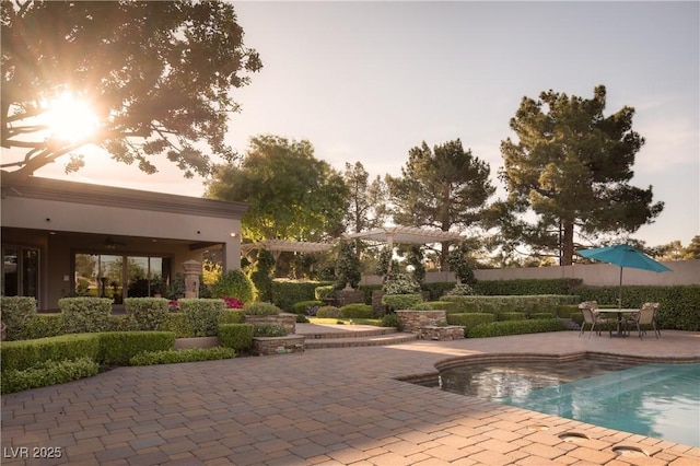 view of pool featuring a ceiling fan, a patio, and a fenced in pool