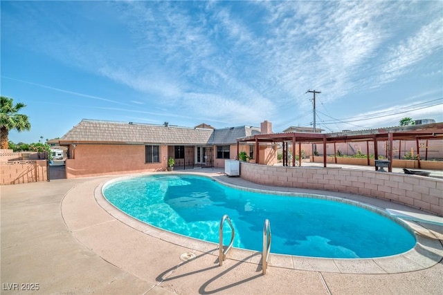 view of pool with a fenced in pool and a patio area