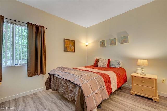 2615 W Gary Ave Unit 2013, Las Vegas, NV 89123 - bedroom with light wood-type flooring and baseboards
