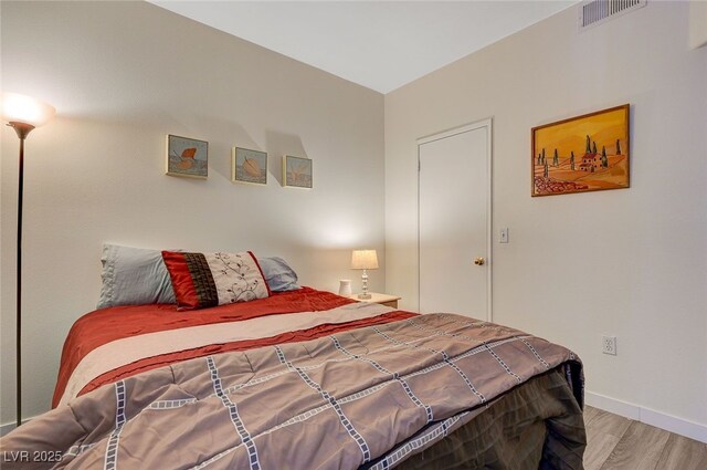 2615 W Gary Ave Unit 2013, Las Vegas, NV 89123 - bedroom with wood finished floors and baseboards