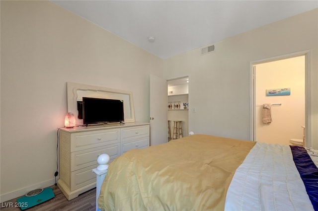 2615 W Gary Ave Unit 2013, Las Vegas, NV 89123 - bedroom with dark wood-style flooring and baseboards