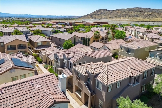 drone / aerial view with a mountain view and a residential view