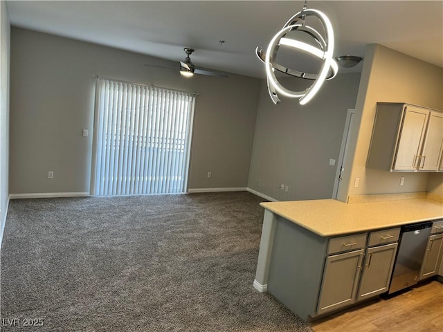 unfurnished living room with ceiling fan, light colored carpet, and baseboards