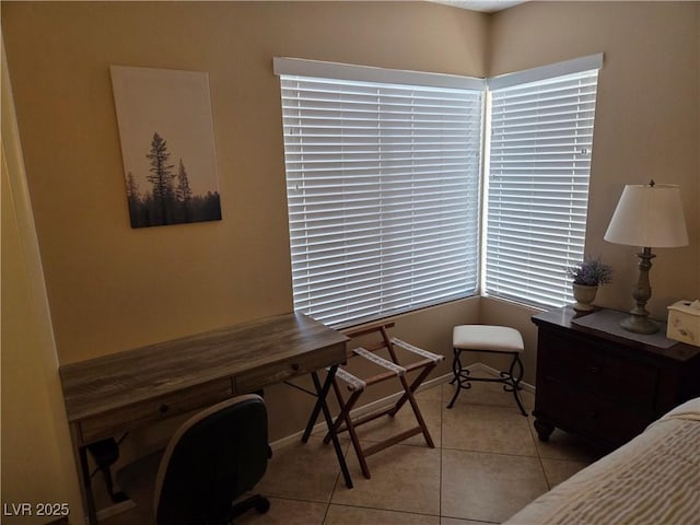 7328 Coffeyville Ave, Las Vegas, NV 89147 - tiled bedroom featuring baseboards