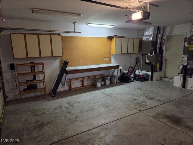 7328 Coffeyville Ave, Las Vegas, NV 89147 - garage with a workshop area, secured water heater, heating unit, and a garage door opener
