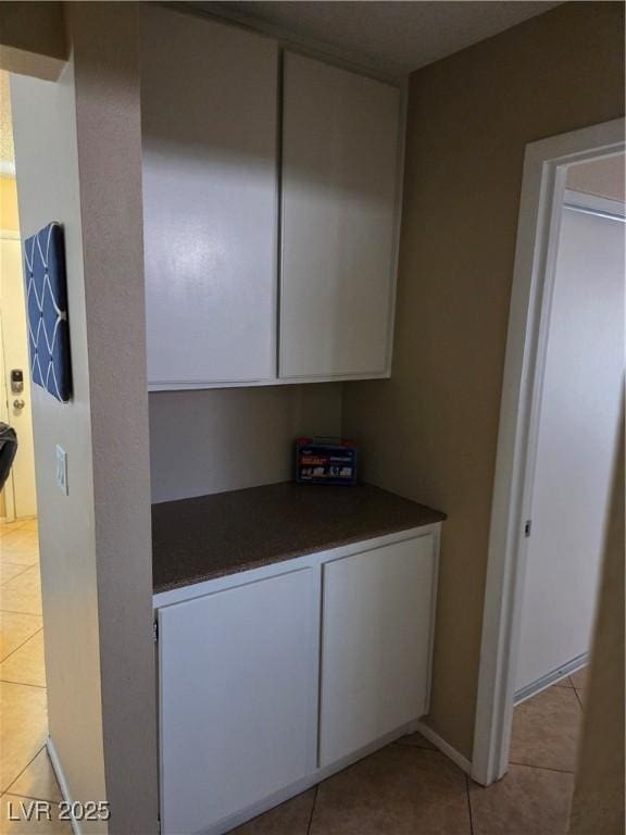 7328 Coffeyville Ave, Las Vegas, NV 89147 - hall featuring light tile patterned floors